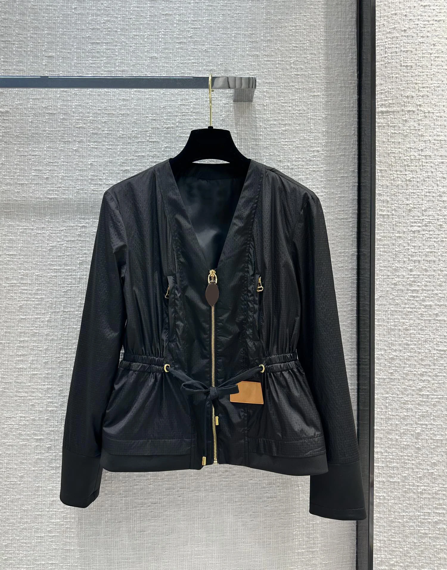 

Drawstring bomber and trench coat. It's a smart, stylish version that goes with everything8.5