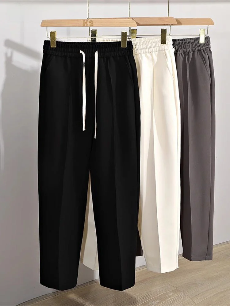 Драпированные повседневные брюки мужские летние свободные драпированные из