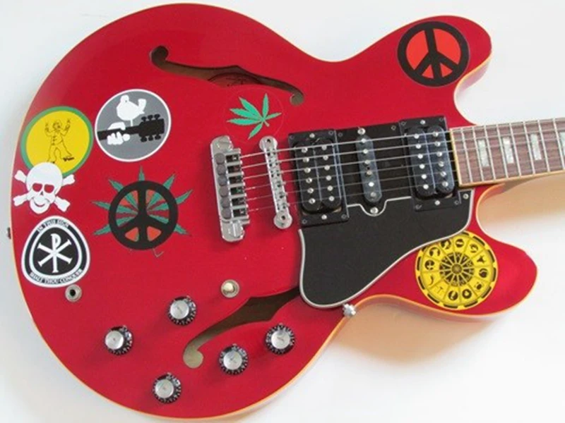 

Custom Alvin Lee Semi Hollow Body Big Red 335 Jazz Electric Guitar Multi Stickers Top, Small Block,60s Neck, HSH Pickup, 5 Knobs