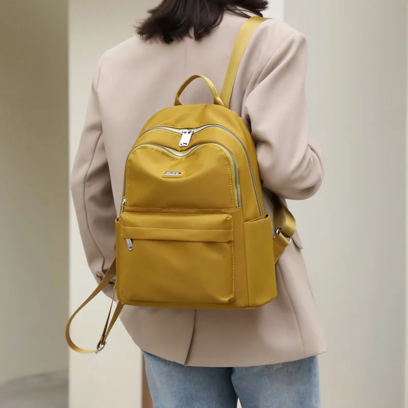 

2022 Fashion Luxury Women's Backpack High Quality Solid Color Waterproof Nylon Travel Backpack Girl's Mochila Student Bag