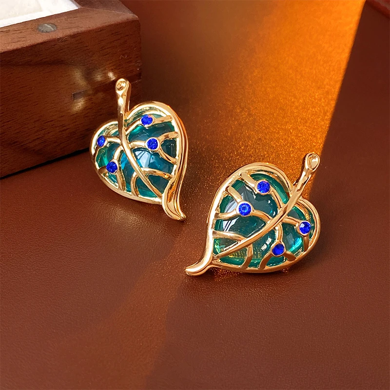 

Retro Glazed Leaf Earrings Hollowed Out With Diamonds Contrasting Color Metal Sense Earrings Fashion Women Girls Accessories