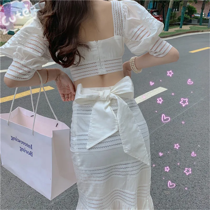 

Summer Women 2PC White Dress Sets Two Piece Hollow Out Sexy Crop Top&High Waist Mermaid Skirt Suits Bowtie Back Slim Skirt Sets