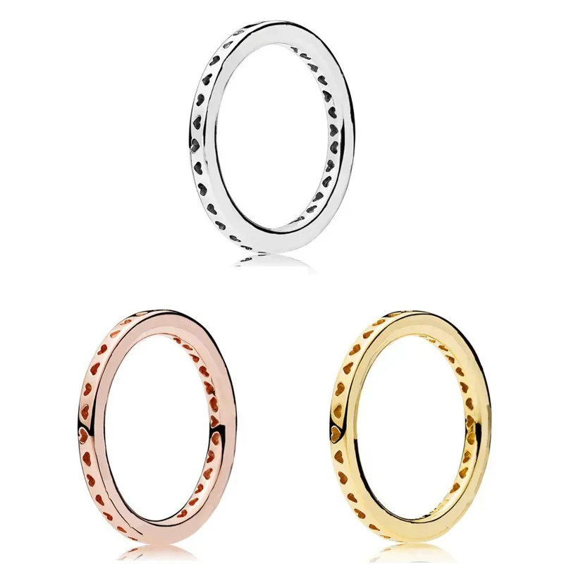 

Женское кольцо из серебра 925 пробы, со сверкающими розовыми и золотыми сердечками
