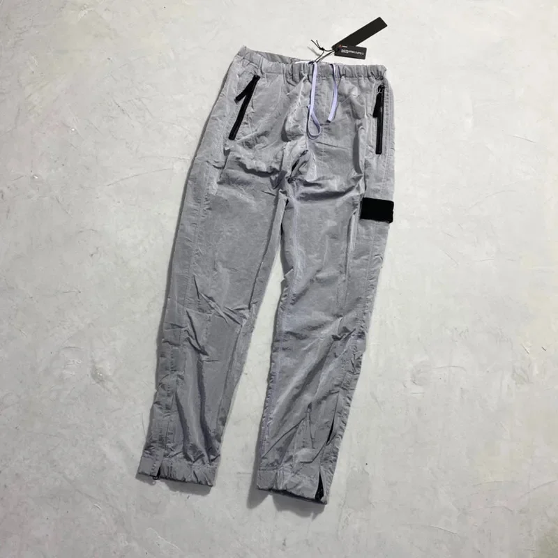 

2023 Men's and Women's Spring and Autumn Nylon Pocket Embroidered Badge Casual Thin Reflective Pants Cargo Pants Safari Style