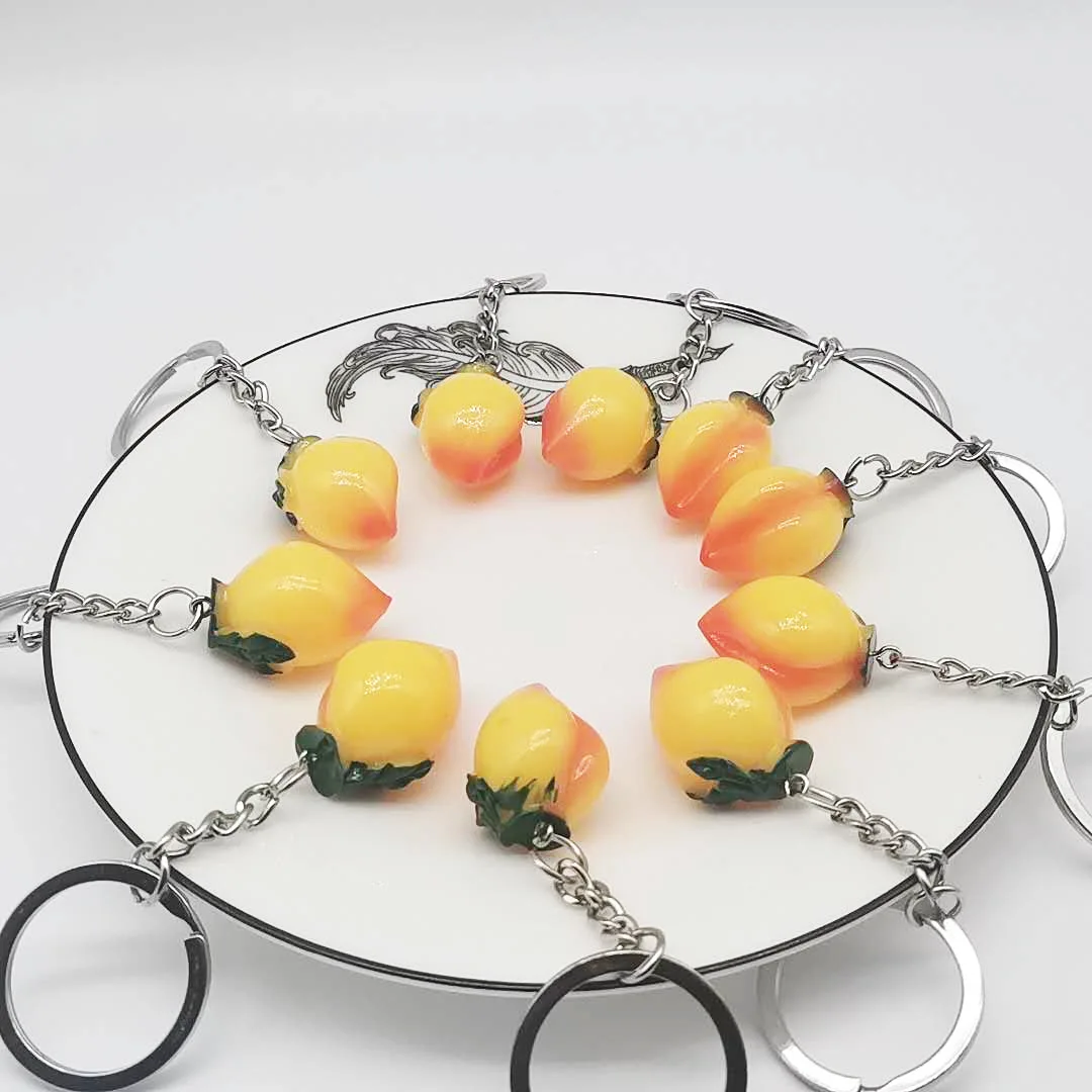 1PCSNew small gift fruit peach keychain mini ornaments girls bag pendant promotional gifts wholesale |