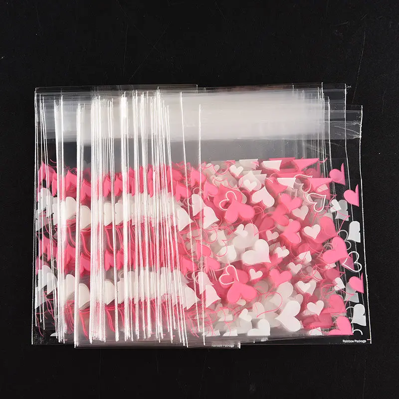 

100PCS Cute Heart Transparent Cookies Candies Bag Self-adhesive Christmas Food Baking Gift Packaging Bags Stationery Holder