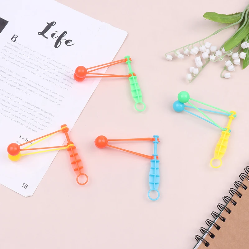 

Classic Nostalgic Leisure Plastic Hand Shaking Double Balls Kids Novelty Assorted Stress Reliever Toys Birthday Gift Party Favor