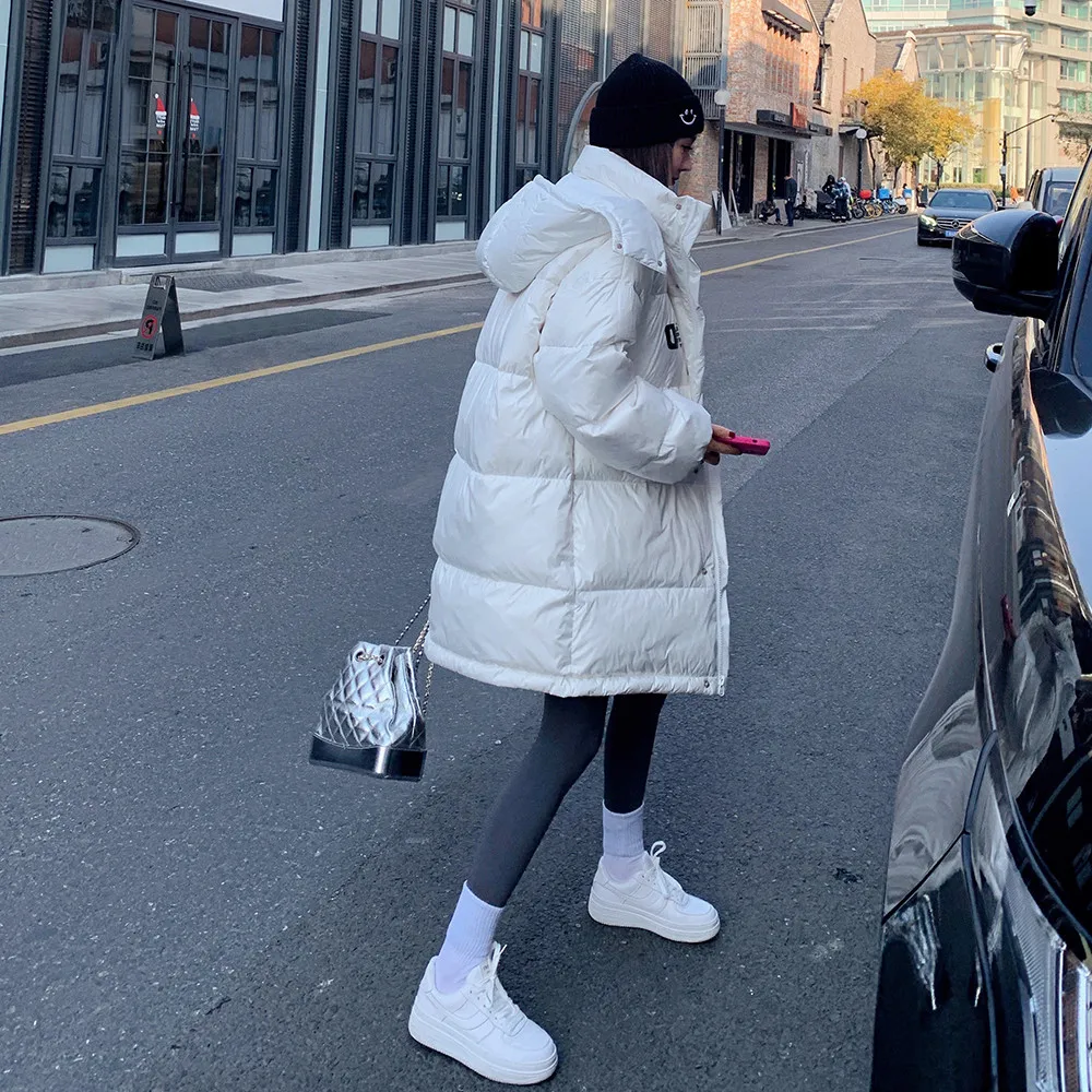 

2021 new winter thickened duck down loose coat European fashion off-season middle and long hooded white down jacket for women
