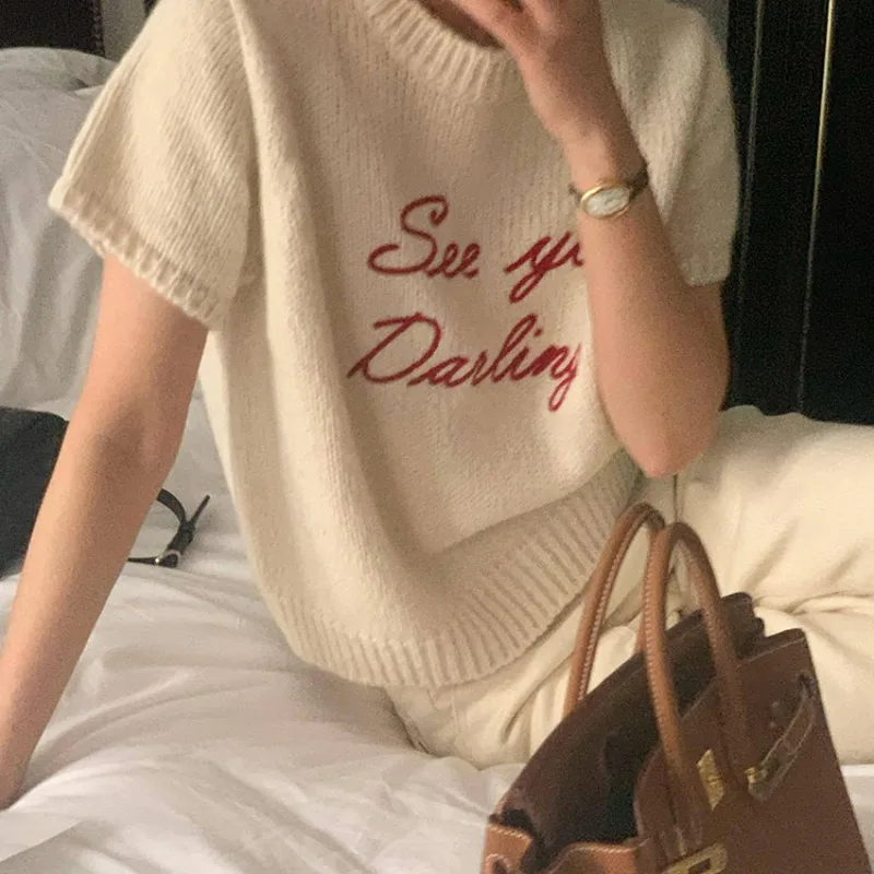 

Korean autumn and winter French sweet round neck embroidery letter jacquard loose casual all-match knitted sweater woman