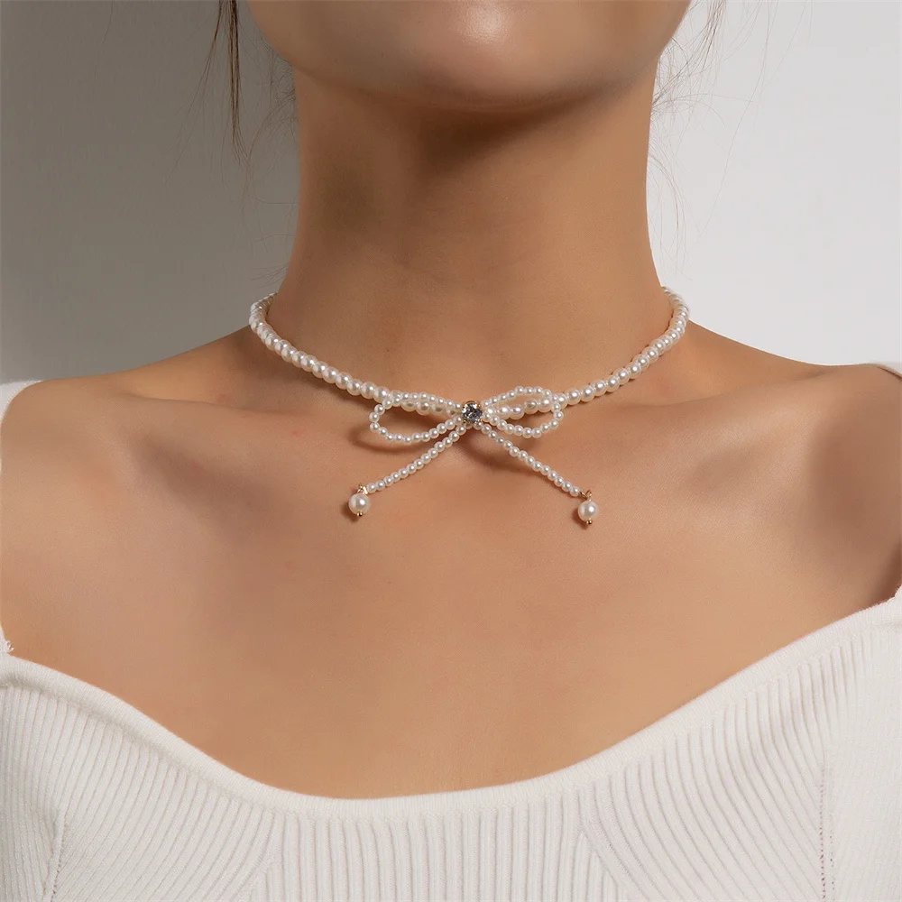 

Fashion trend full of Pearl tassel temperament Necklace studded bow chain women's gift European and American Jewelry