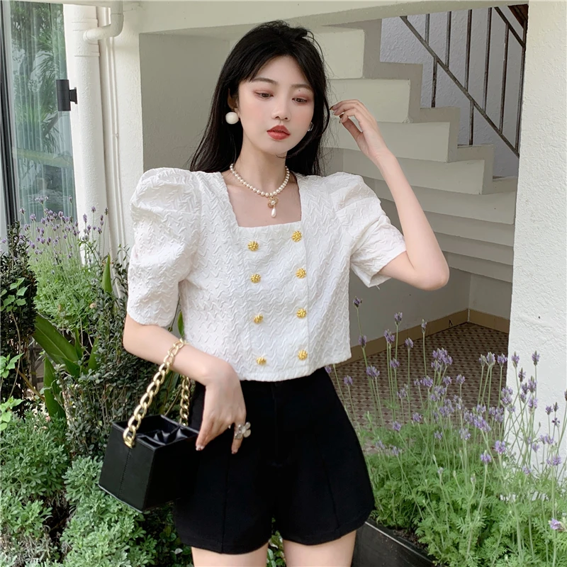 Make the net price of French small collar short jacket summer han edition female embossing hubble-bubble sleeve shirt double-bre |