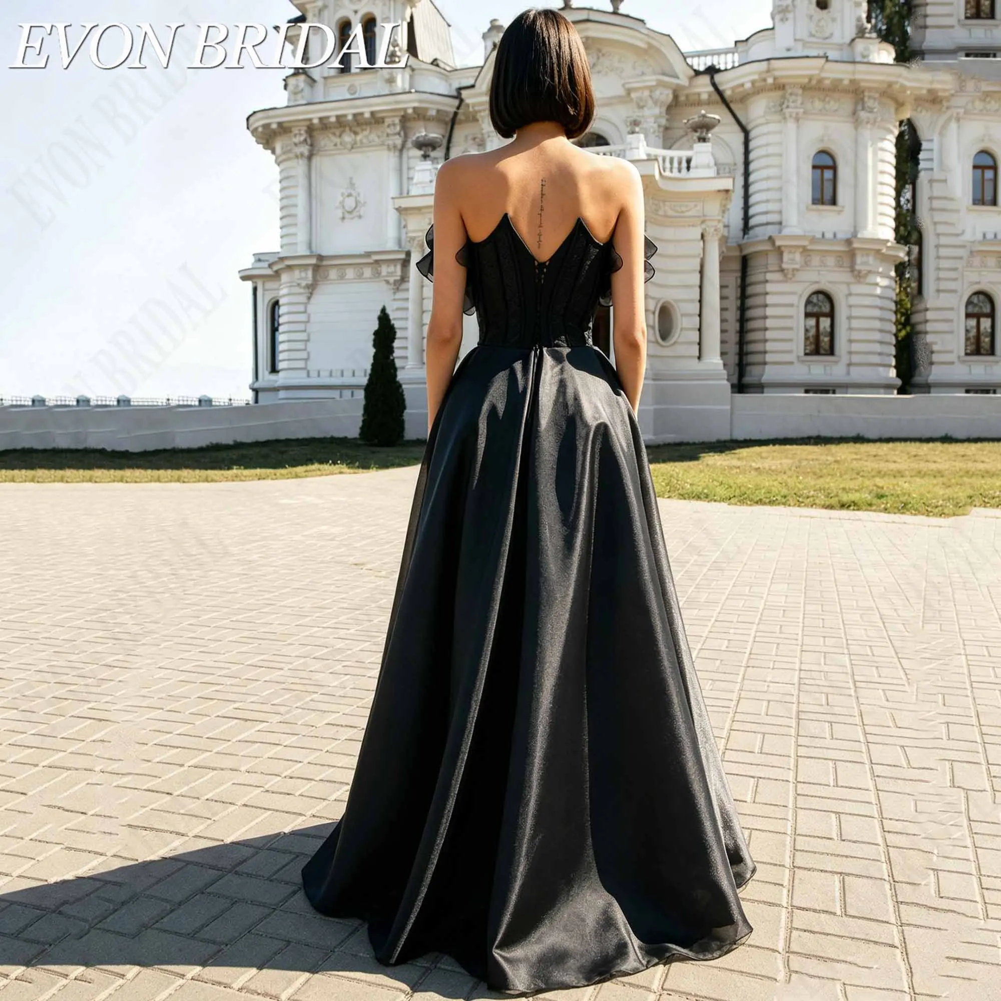 Фото EVON BRIDAL Элегантное вечернее платье без бретелек корсет из органзы с объемными цветами для гостя свадьбы коллекция 2026 на заказ легкая воздушная силуэт объемные цветочные декоры полупрозрачная ткань с уникальной №3