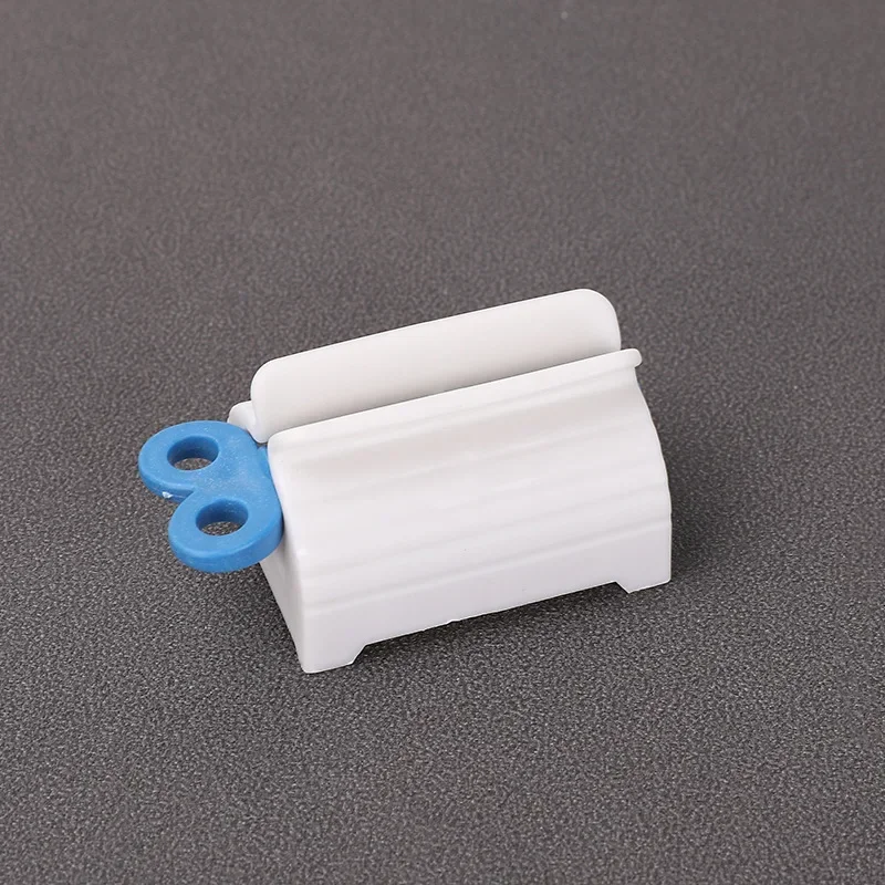 MOONBIFFY Вращающийся диспенсер для зубной пасты