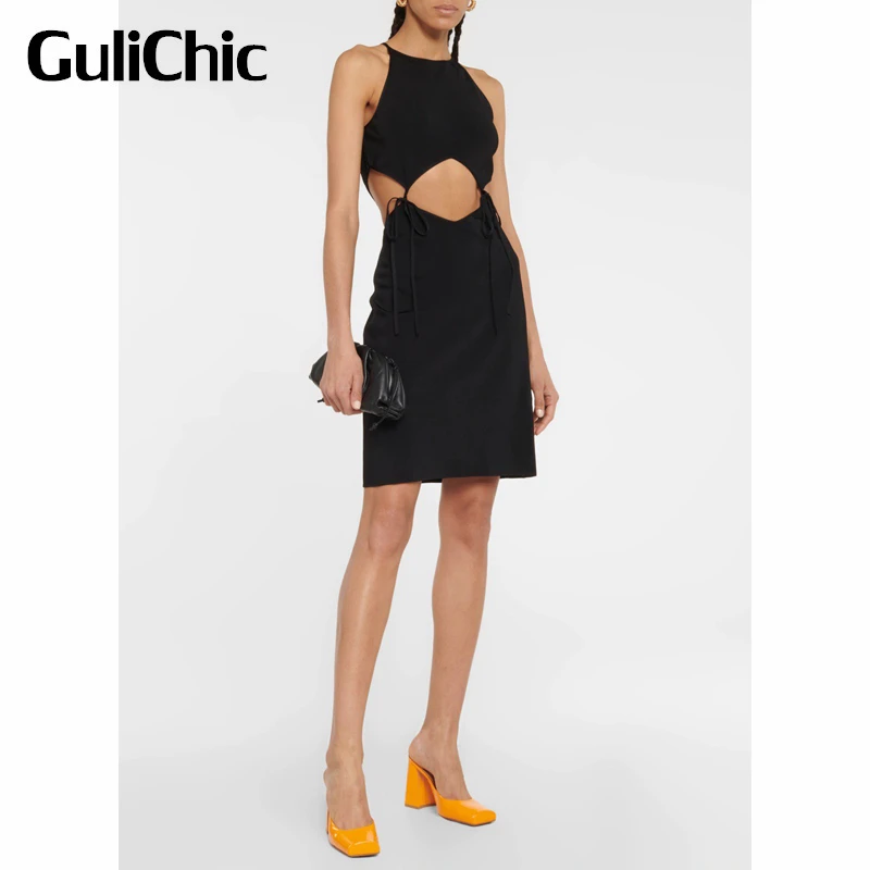 

6.17 GuliChic Women Sexy Hollow Out Knitted Sleeveless Suspender Lace-Up Design Party Slim Mini Dress