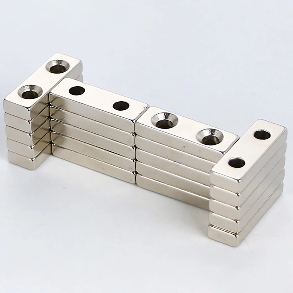 Неодимовые магниты с двумя отверстиями 30x10x3 мм квадратные никелированным