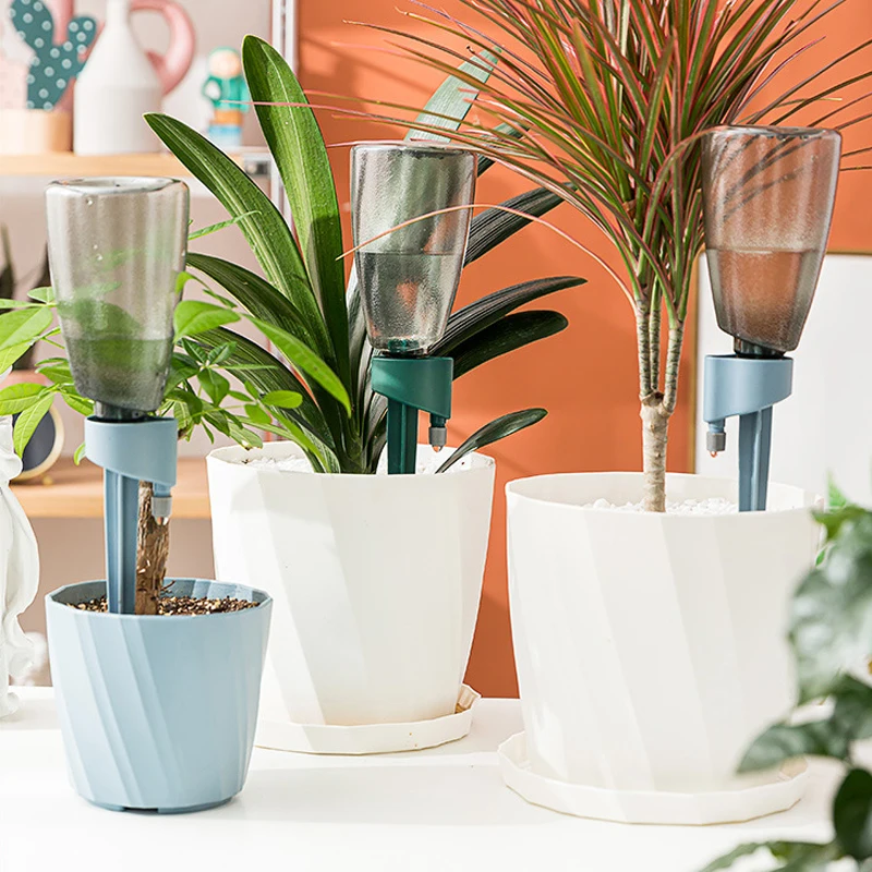 

New Plant Watering Dripper Devices Adjustable Self Watering Spikes For Travel Indoor Flower Potted Plants Auto Irrigation System