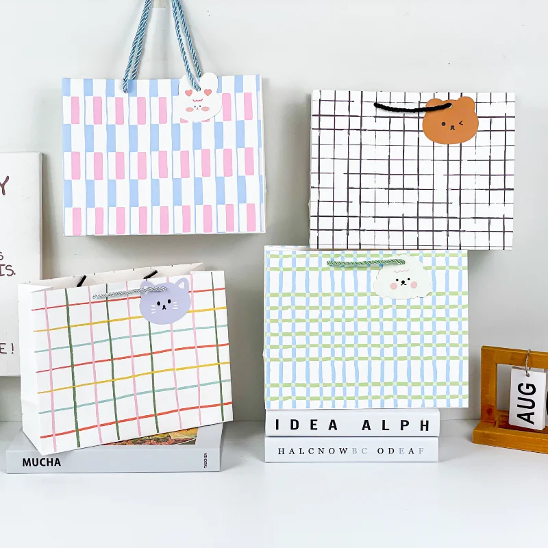 

Cute Exquisite Embossed Solid Gift Bag Various Thickened Reinforced Kraft Paper Tote Bags Gift Clothing High-end Packaging Bag