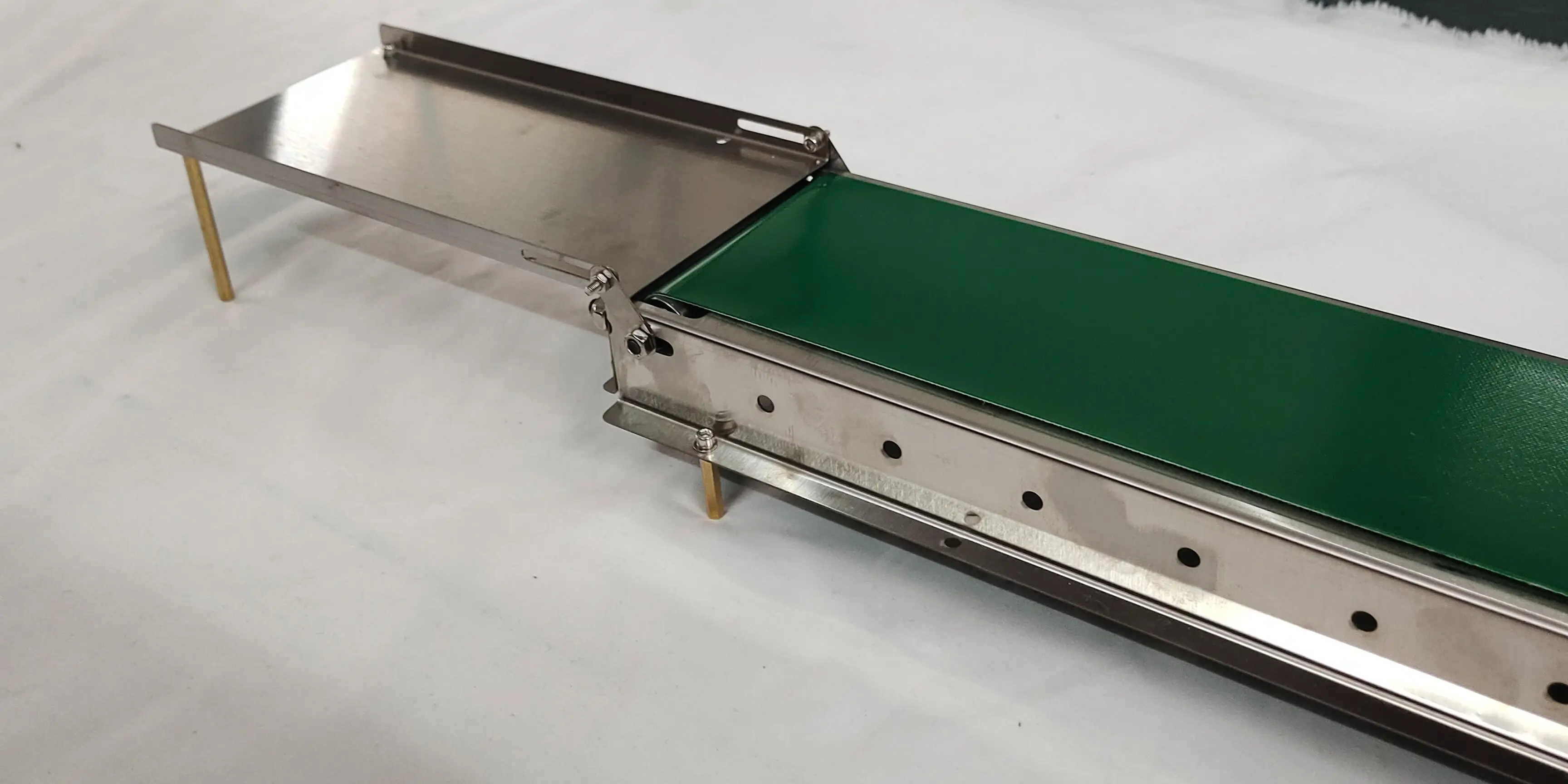 

Мини-конвейер Longxuanyin lx601020 из нержавеющей стали