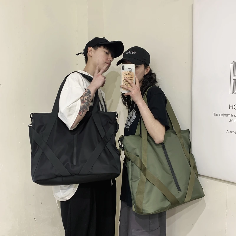 

Large capacity fitness travel storage bag luggage bag one shoulder diagonal straddle portable waterproof shopping bag