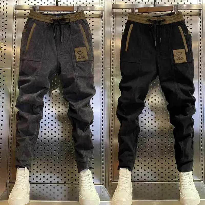 

Весенне-осенние вельветовые брюки, мужские высококлассные облегающие брюки в полоску, шаровары в том же стиле с небольшими ногами, повседне...