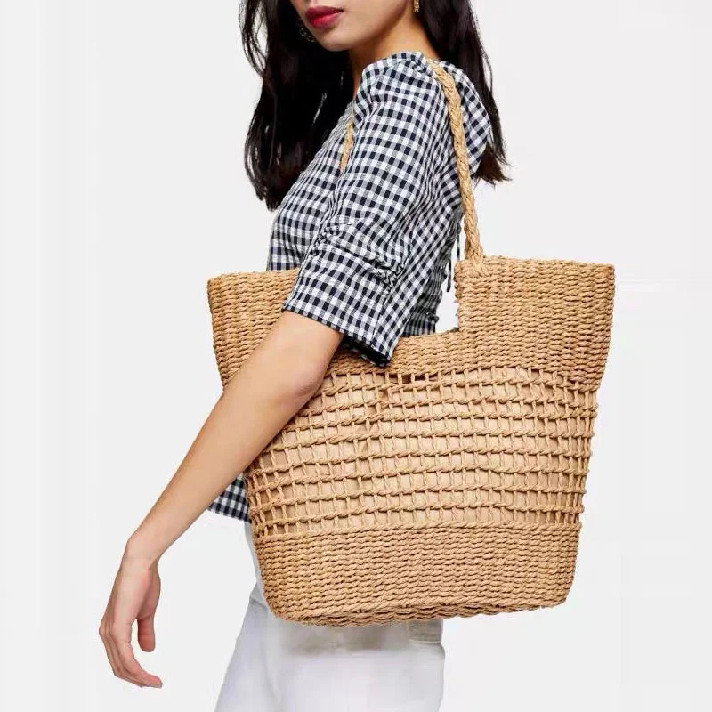 

New temperament forest female straw woven bag straw bag hollow woven bag female shoulder portable female big bag