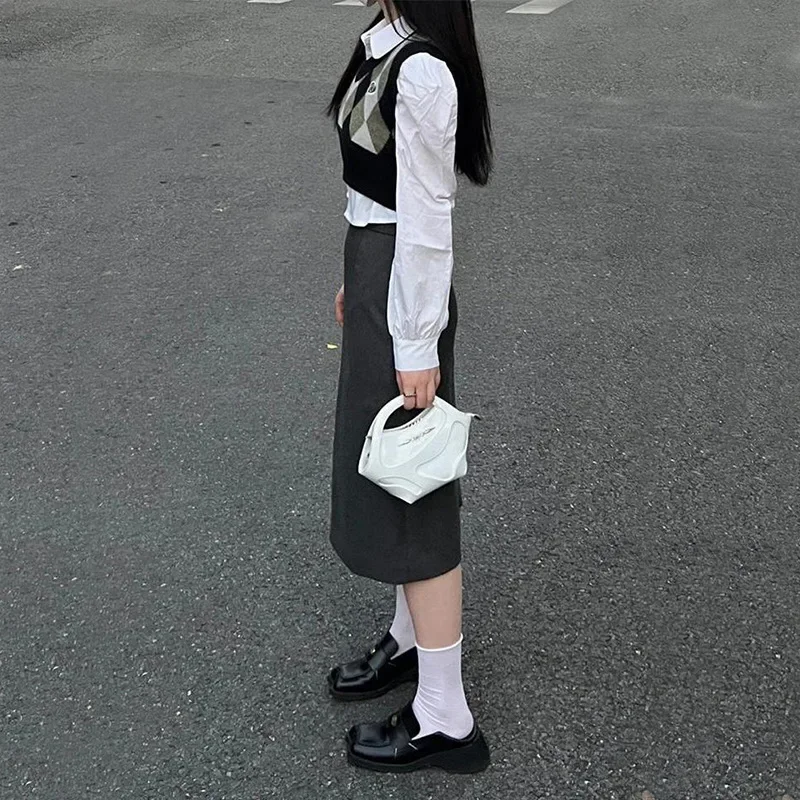 Вязаный топ в консервативном стиле жилет многослойный свитер ранняя осень зима