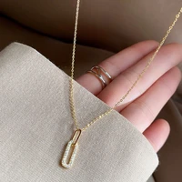 the new oval inlaid zircon pendant necklace for womens simple and fashionable hollow double circle interlocking clavicle chain