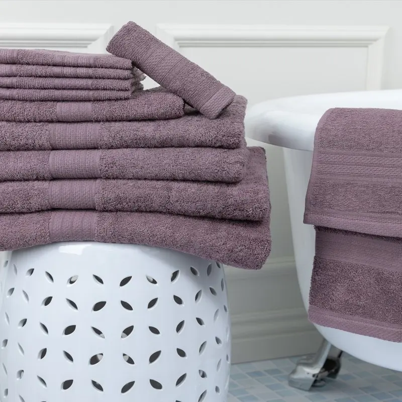 

Luxurious 12-Piece Set of Soft, Plush Purple Cotton Bath Towels for a Pampered, Relaxing Experience.