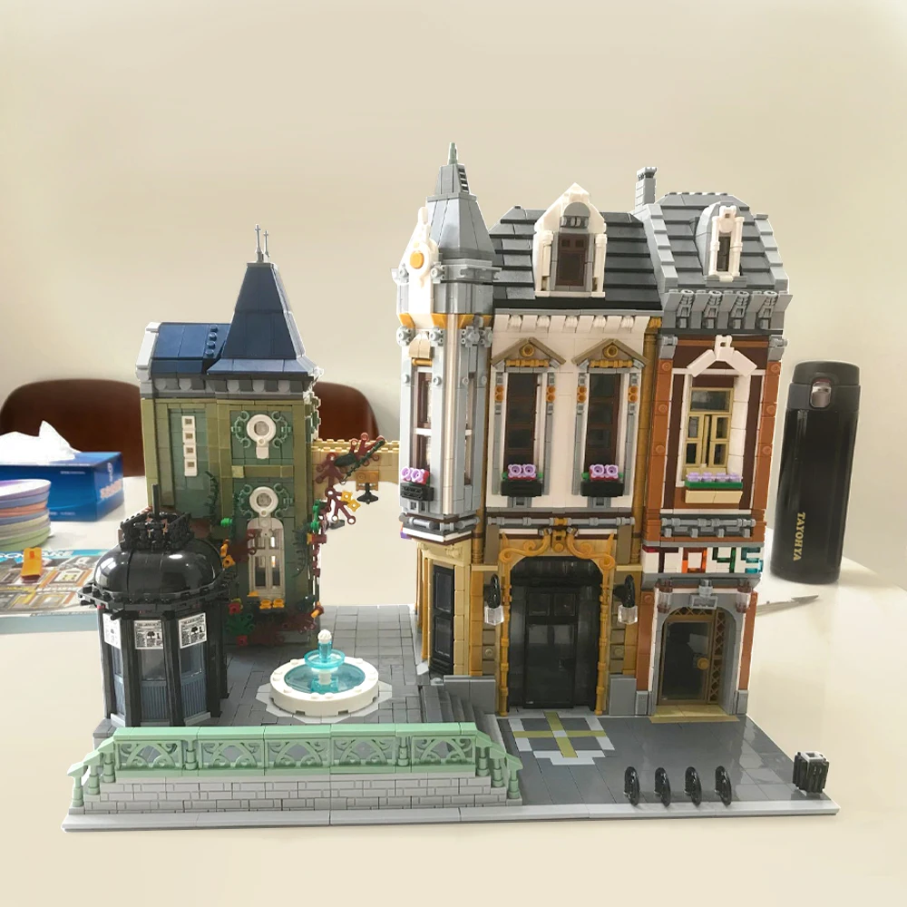 

JIESTAR креативный эксперт город улица вид дом магазин игрушек 89112 кубики Moc Модульные строительные блоки модель игрушка подарок сборка площад...