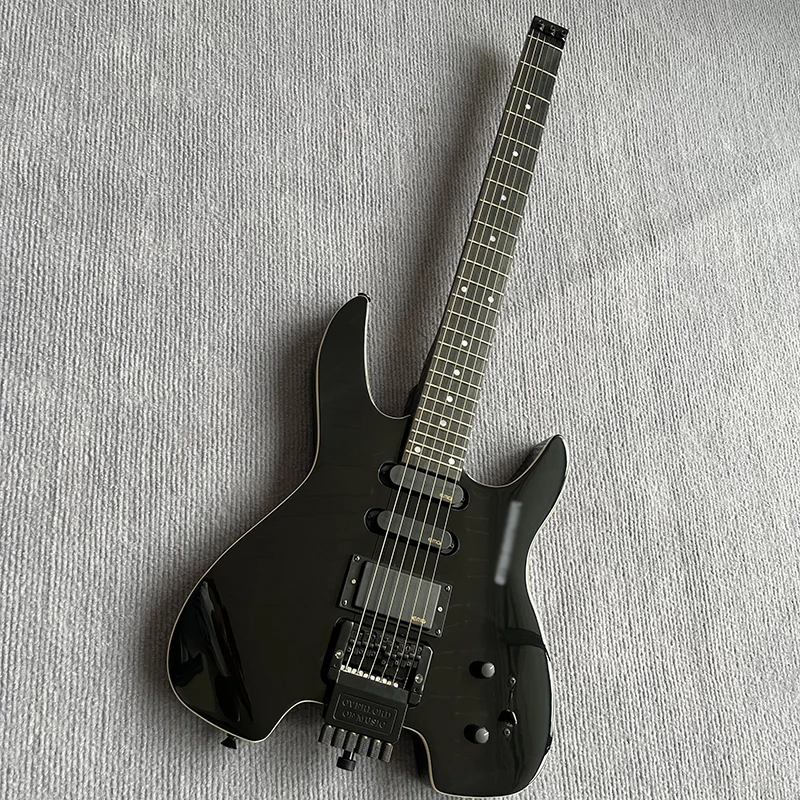 

Classic headless electric guitar, black bright paint, quality hardware accessories, vibrato system, free delivery to home.