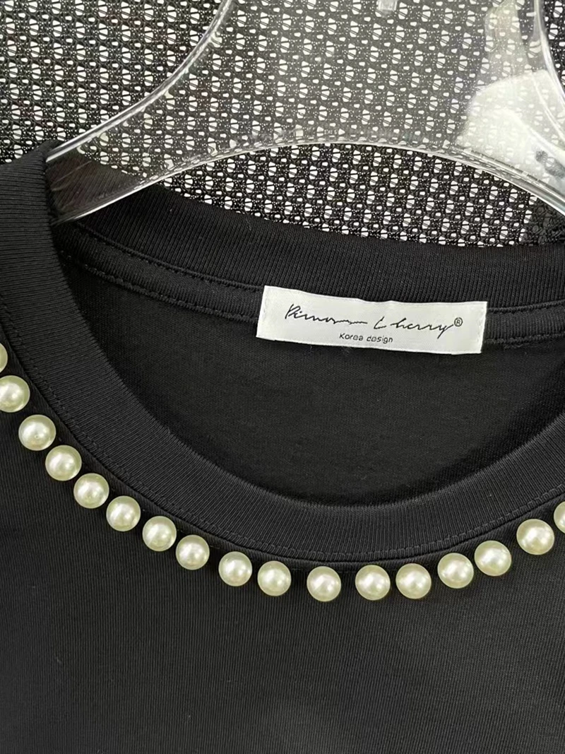 Женская свободная футболка с бусинами