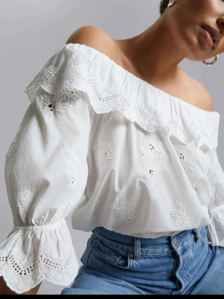 

Hollow out Ruffles Blouse Women Embroidery White or Black Top Slash Neck 2023 Early Autumn Female All-match Shirt