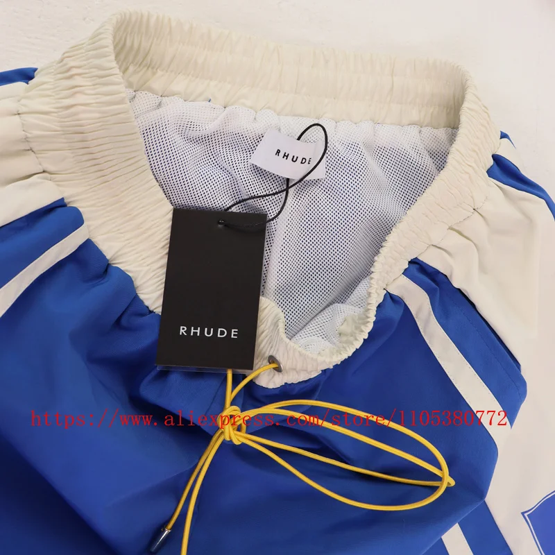 Фото Новые мужские спортивные шорты RHUDE в стиле ретро с цветными вставками, светло-голубые, на шнурке, для уличной моды, пляжные шорты №2