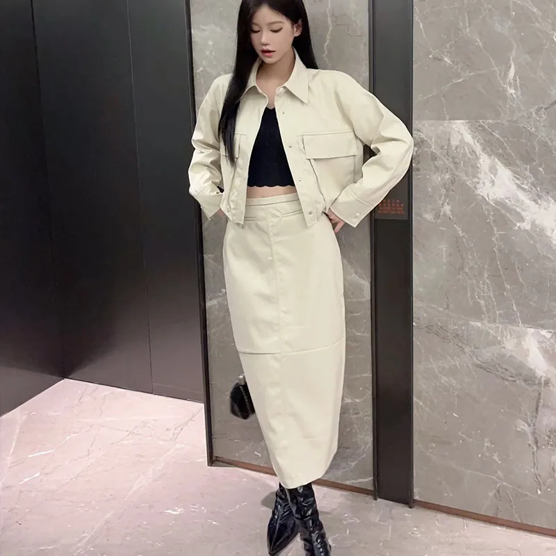

Winter Women's Two-piece 2023 New Casual Fashion Work Button Leather Jacket High Waist Pure Colour Leather Half-body Skirt Set