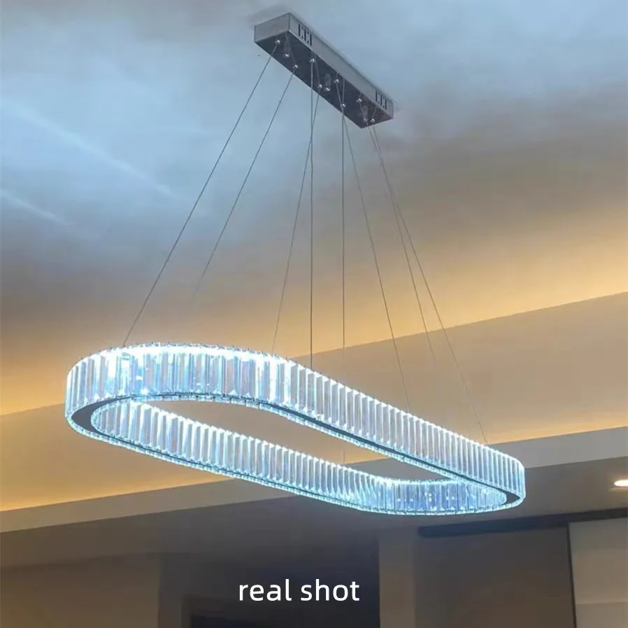 Дешево Роскошные овальные стальные светодиодные подвесные светильники с регулируемой яркостью для столовой, золотистые хромированные светильни...