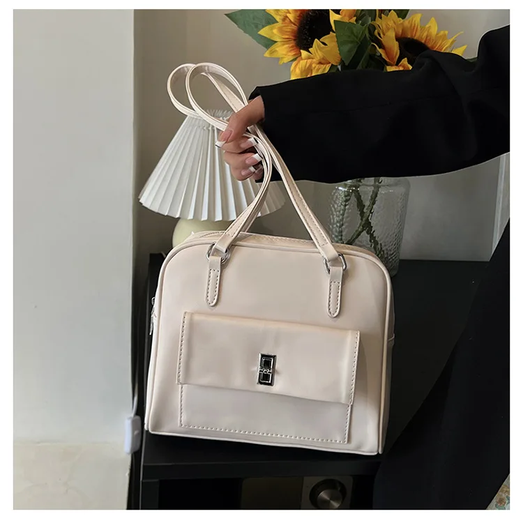 

New Trend Fashion Temperament Female Simple Large Capacity Retro College Wind Tote Niche Design Versatile Commuter Shoulder Bag