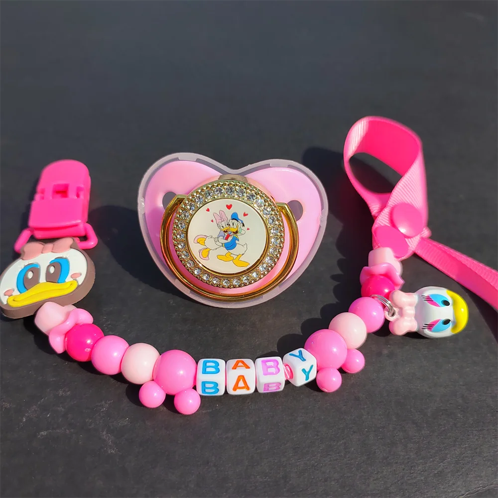 

[ 1 Set] 2022 New Pink Daisy Duck Bead Chew Pacifier Clips and Pacifier Orthodontic Soft Christmas Gift Chupetero Mothers & Kids