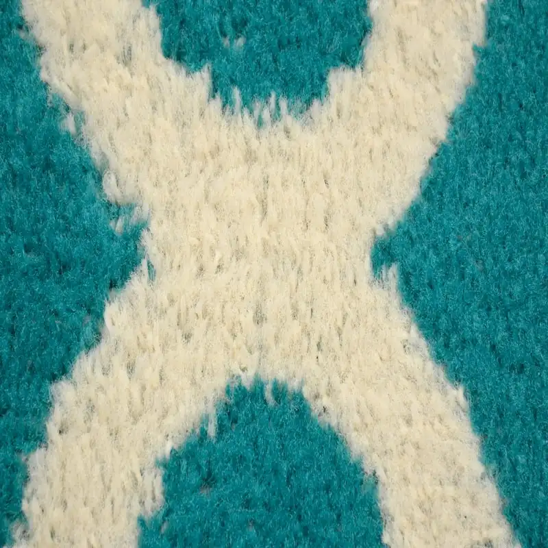 

Teal/Ivory 45"x66" Geometric Indoor Area Rug