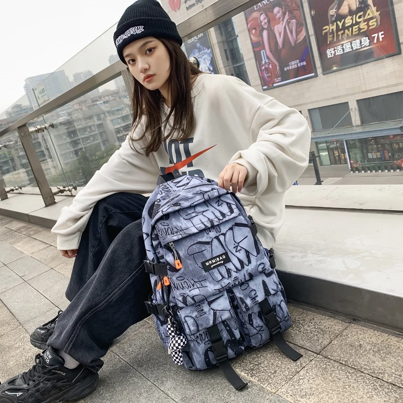 

Large-capacity Cool Graffiti Backpack Women Man Waterproof School Bags for Teenagers Geometric Travel Backpack Ladies Bookbags