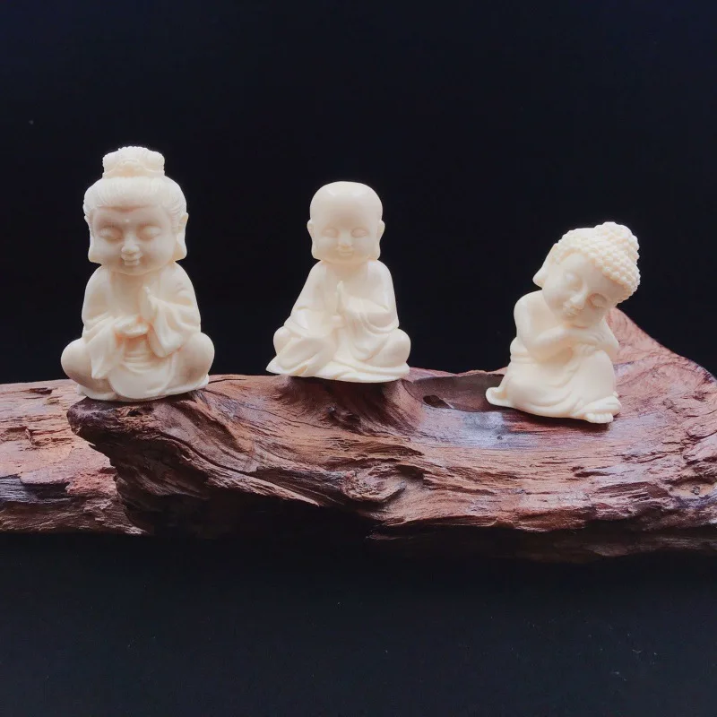 Резной орех цвета слоновой кости вращающийся три Святых Шакьямуни Дизань король