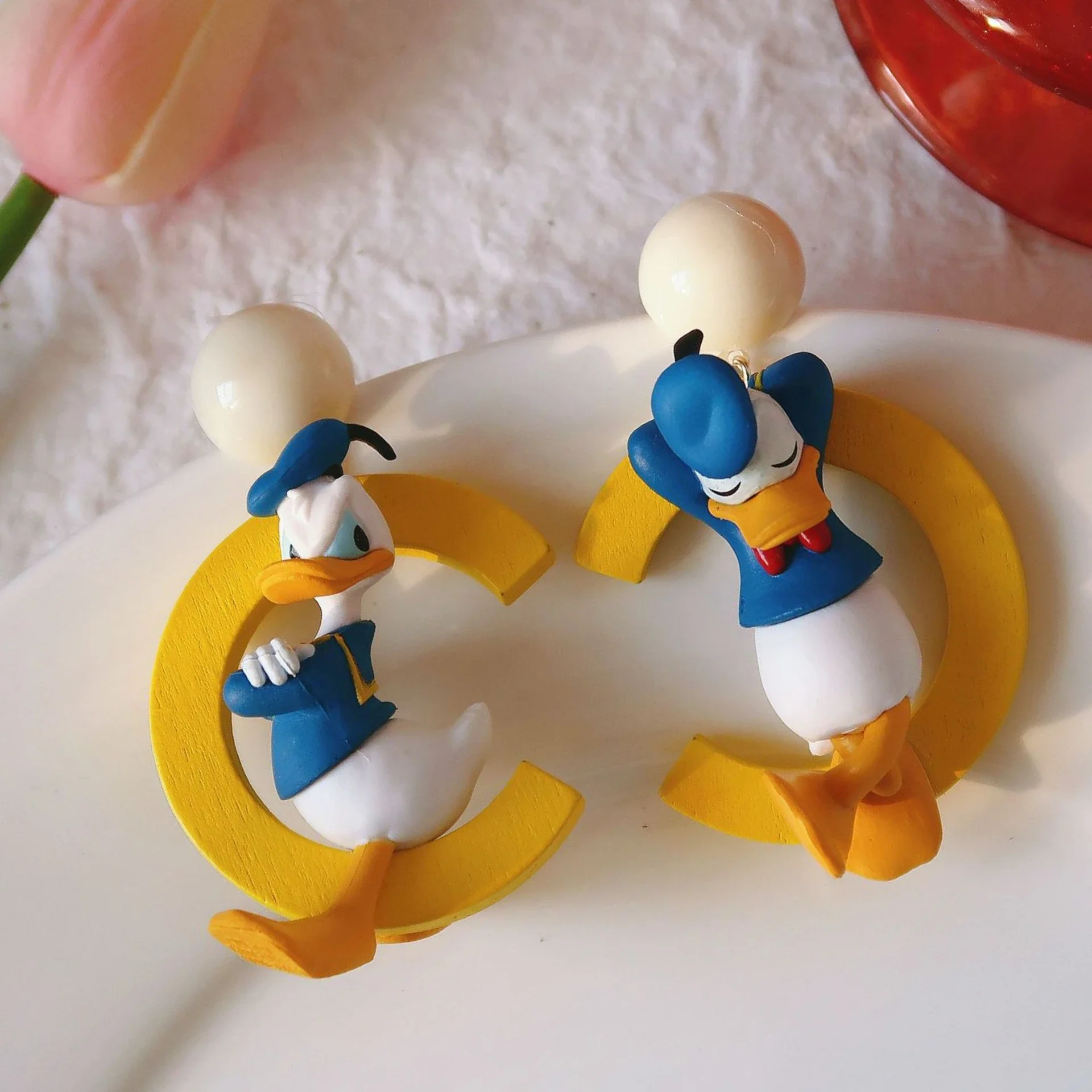 Серьги-гвоздики MINISO с Дональдом Даком