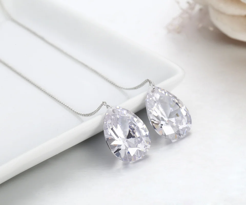 Серьги-подвески Elva Dong капельки циркония белые и золотые