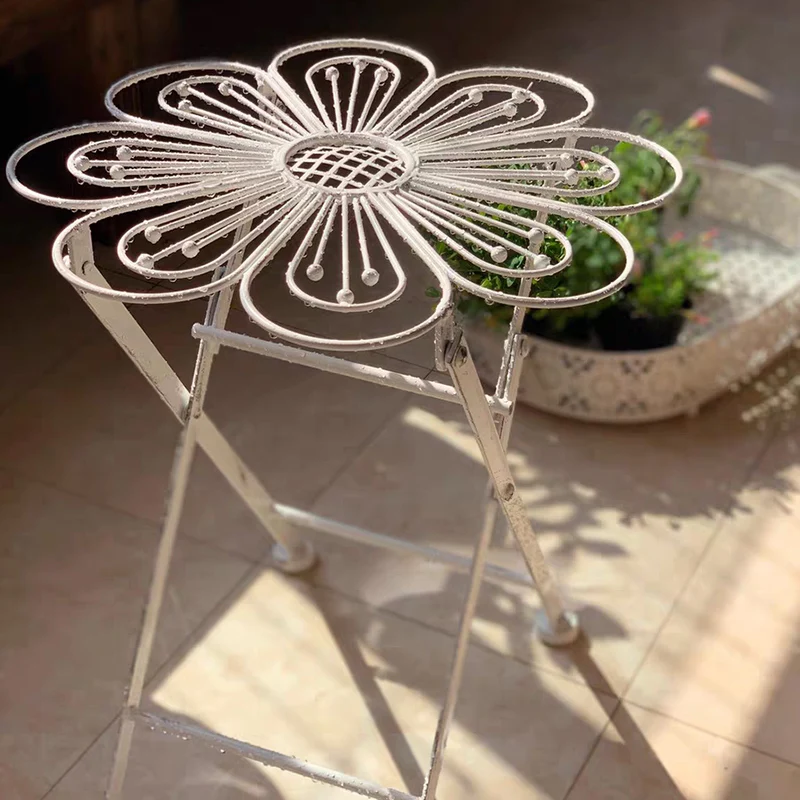 

Retro made old iron folding flower tables, chairs, stools, small flower racks, stools, aesthetically pleasing mini European