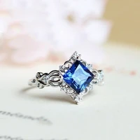 noble and elegant woman with sapphire princess ring