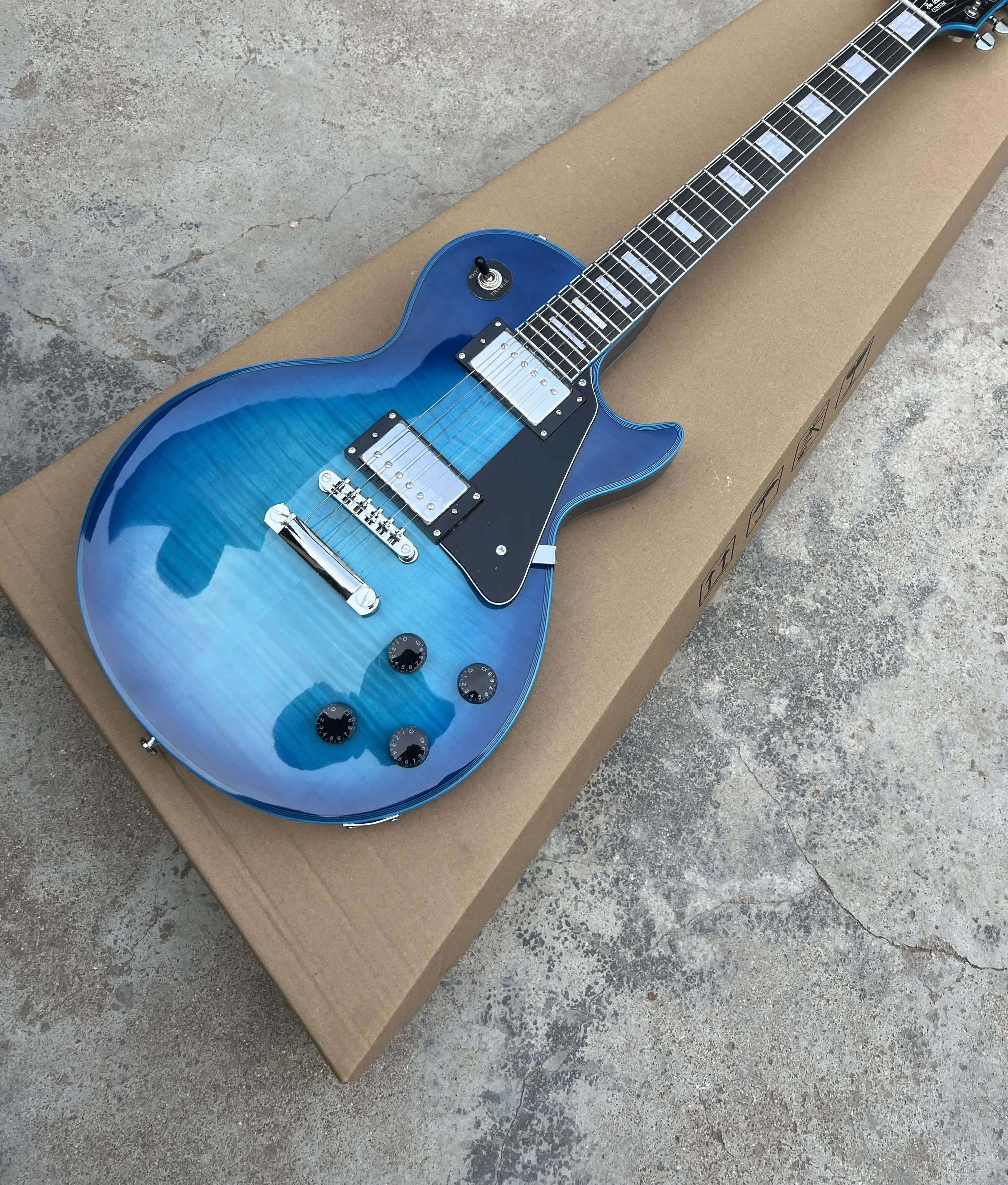 

Custom LP Electric Guitar Sky Blue Burst Color Solid Body With Maple Flame Top ,Rosewood fingerboard,Mahogany body free shipping