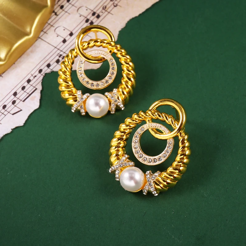 

Женские серьги-гвоздики с искусственным жемчугом, золотистого цвета