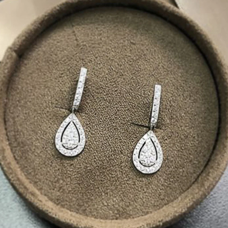 

Huitan Silver Color Pear Shaped Drop Earrings for Women Full Paved White Cubic Zirconia Delicate Girl Earrings Statement Jewelry