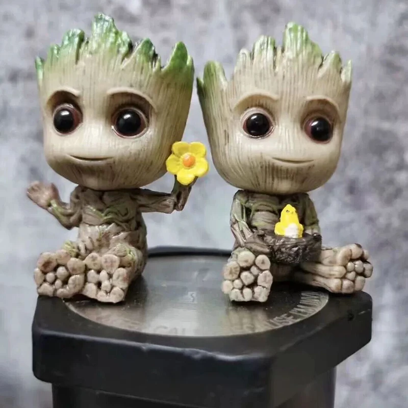 

Anime Tree Man Groot Guardians of The Galaxy Marvel Avengers Mini Baby Grootted Action Figure Car Decoration Kids Toys Gifts 6CM