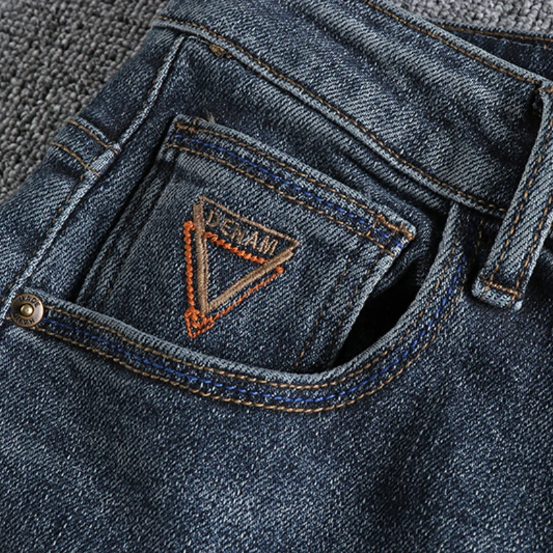 Retro washing blue hole patch jeans men's slim little straight feet trend Europe and America Joker youth long pants