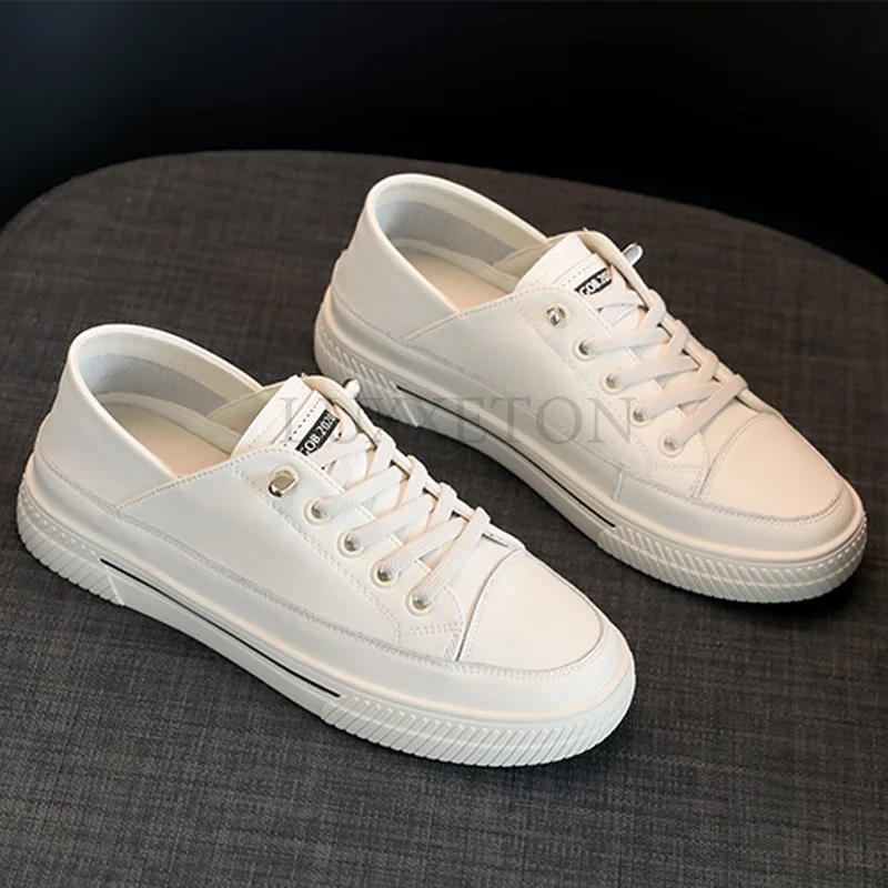 Легкие белые туфли из натуральной кожи на плоской подошве с сеткой для